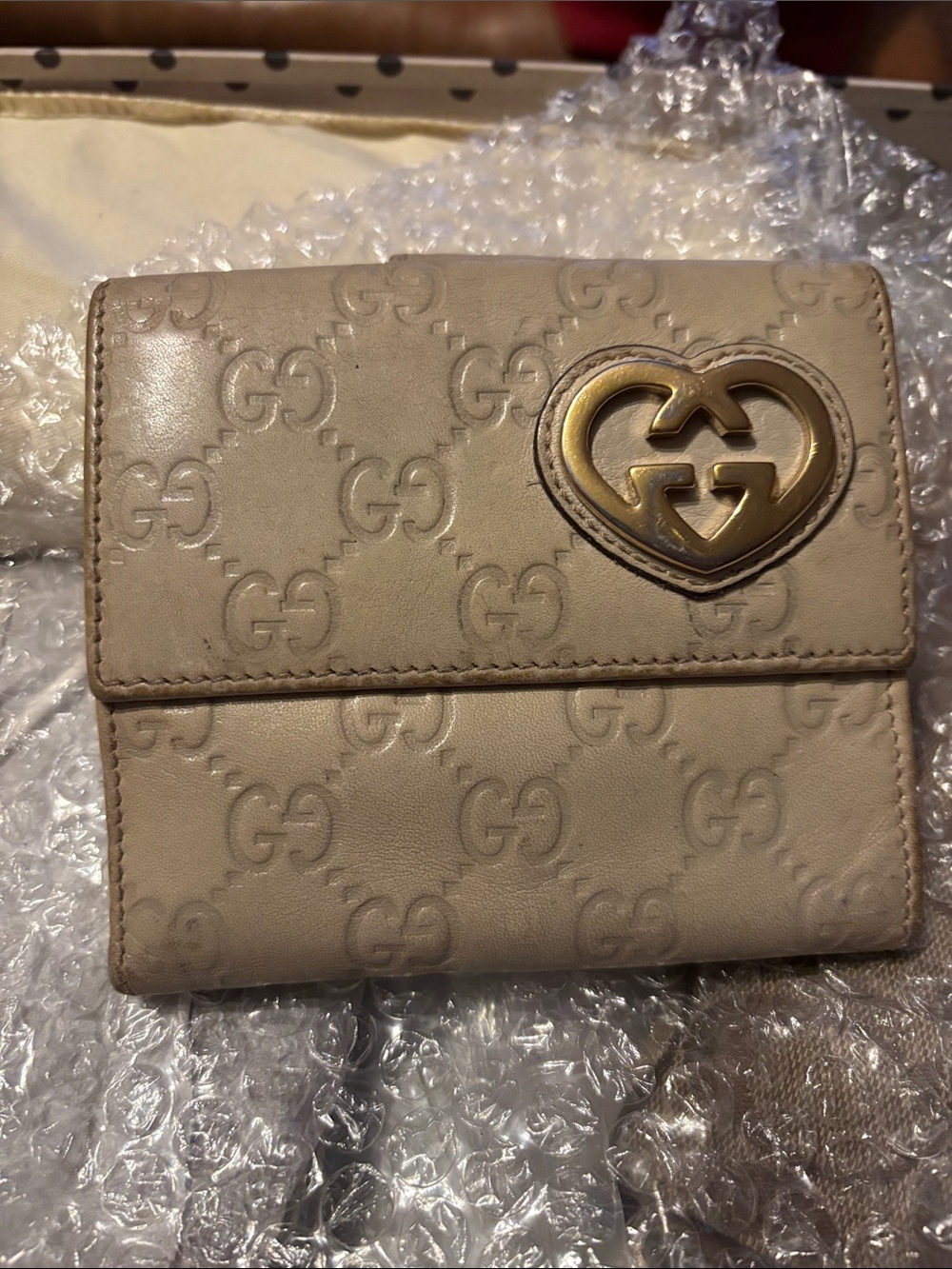 Gucci Beige Embossed GG Leather Wallet with Gold Heart Logo